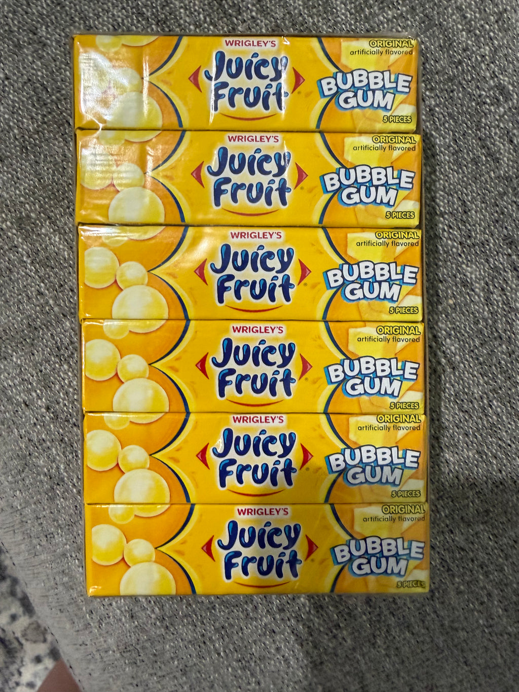 Unopened packs of Juicy Fruit Bubble Gum 18 pack in a box